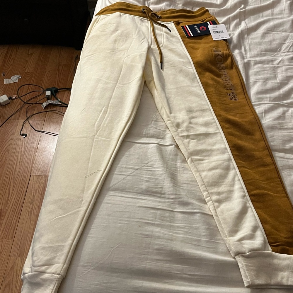 Mens XL fits more like a Large. Cream and light brown